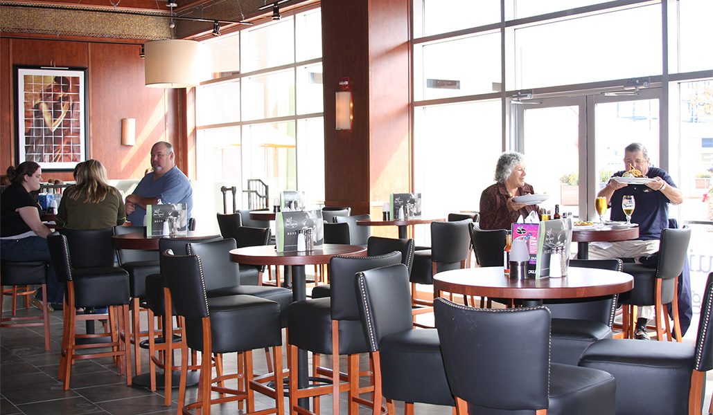 Bar Louie distance indoor dining hero bg mobile Patriot Place