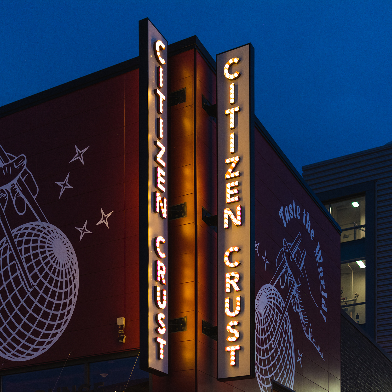 Citizen Crust Sign at Night