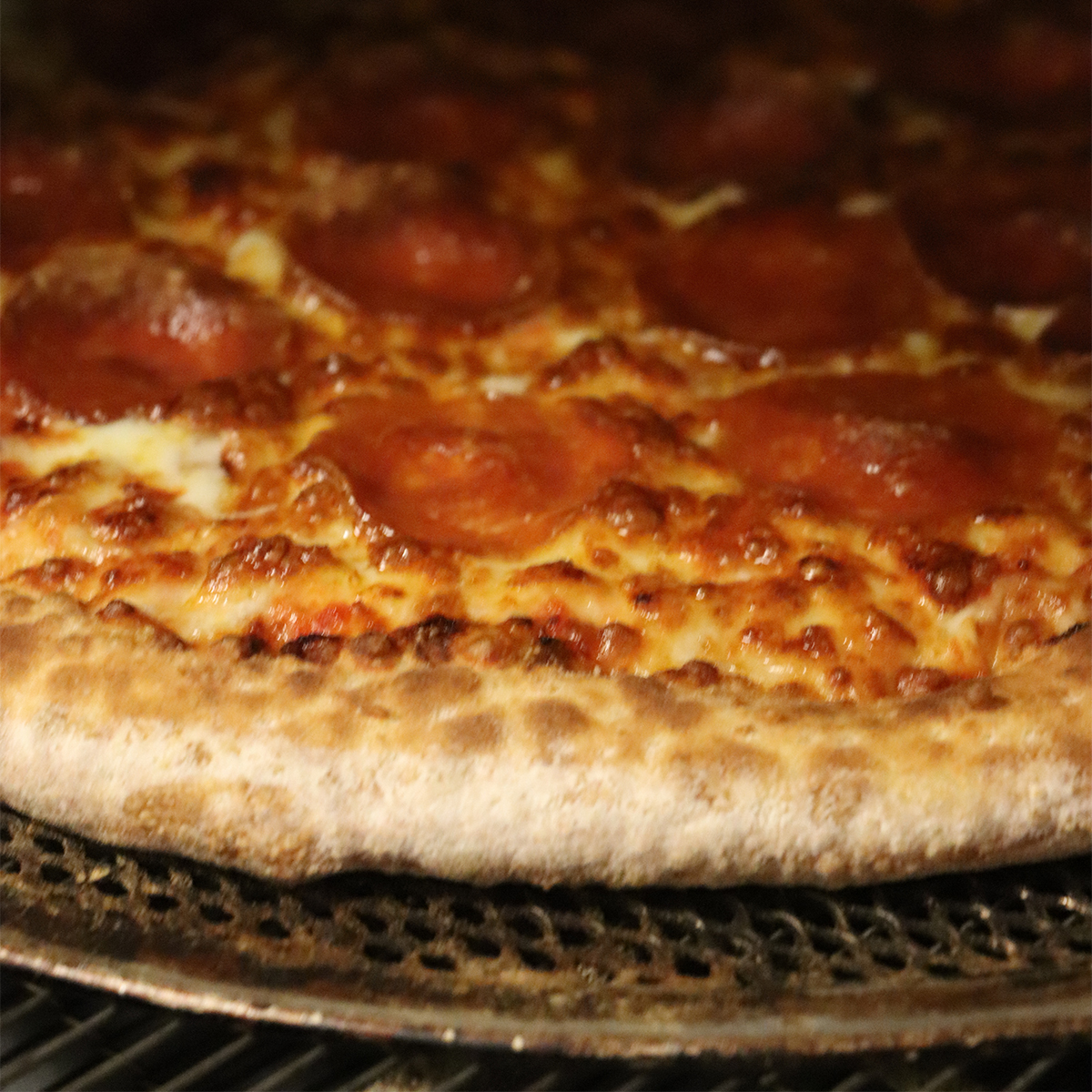 Splitsville Howl Topgolf pizza in oven
